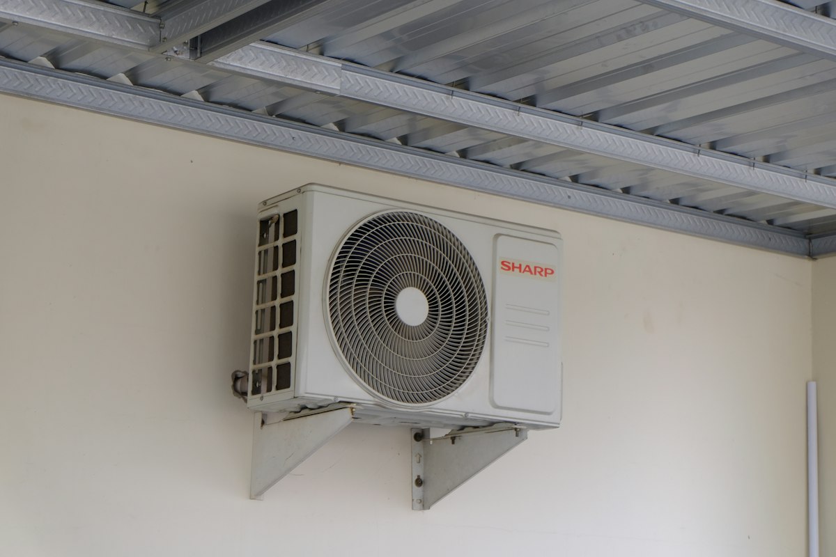 AC outdoor unit fixed on a wall bracket