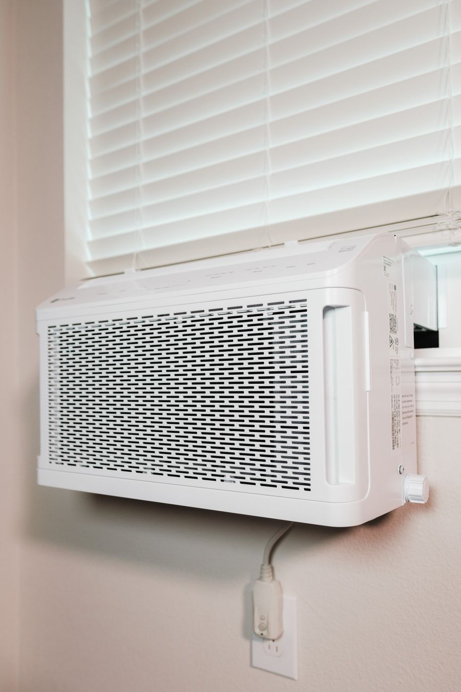 Split air conditioner installed on a wall at home